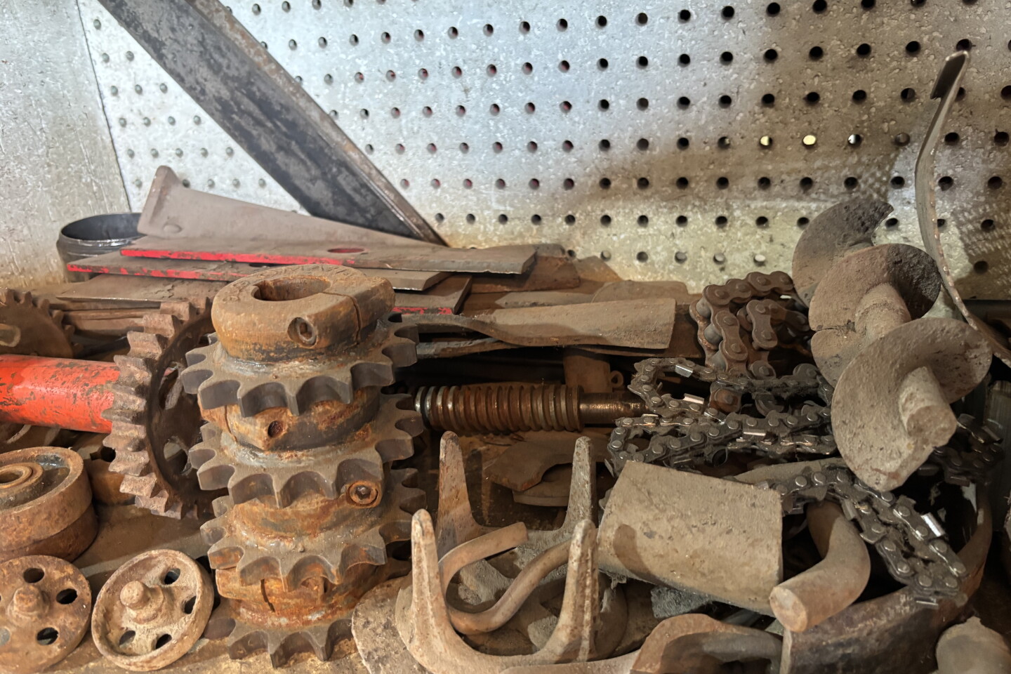 Pat Amberg keeps an inventory of the scrap parts he gleans from the old machinery and other metal he transports for recycling. Gears and wheels are especially prized for the works he and his sons, Jason and Landon, create. The inventory is shown here on June 4, 2026.
