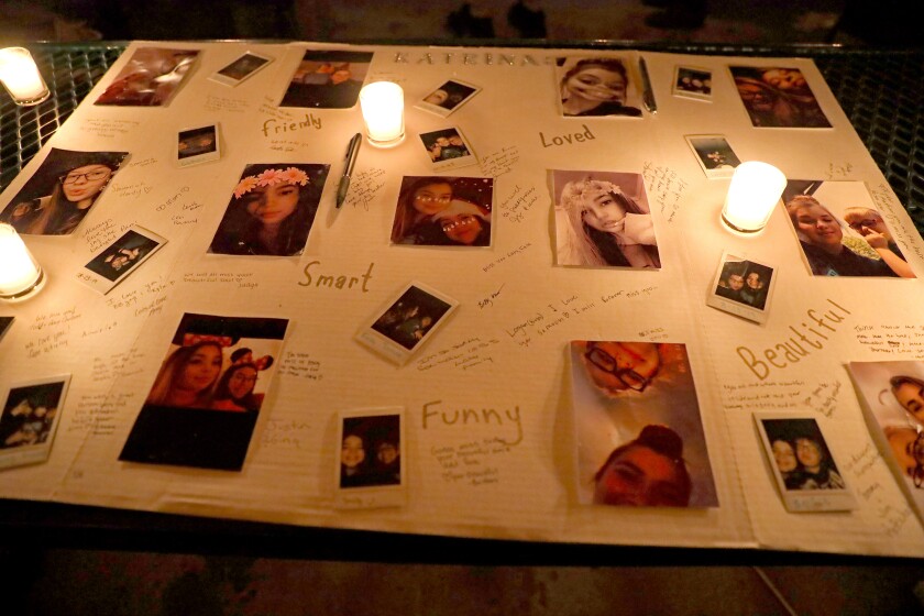 120221.N.BD.CandlelightVigilPictureBoard.jpg
