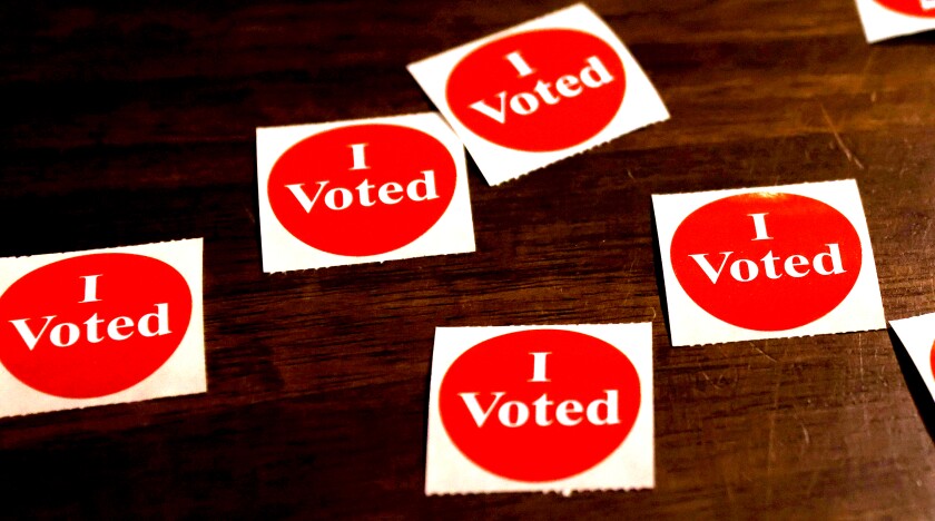 All voters had the option to take an I Voted sticker upon turning in their completed ballot at their polling place Tuesday, Nov. 8, 2022.