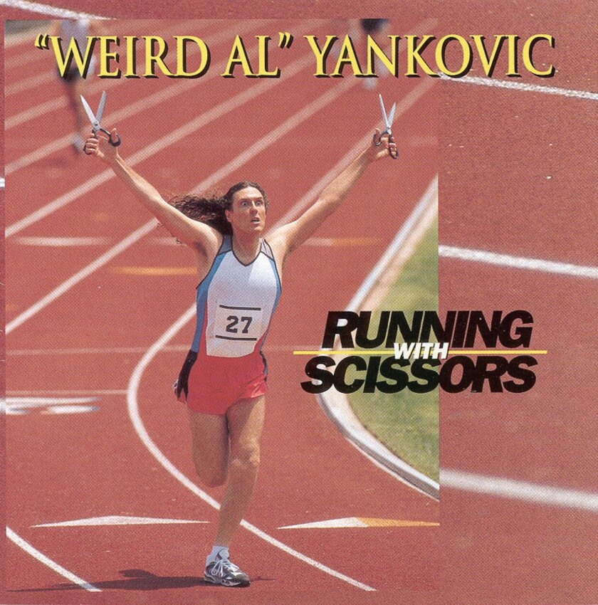 Album cover: "Weird Al" Yankovic, "Running With Scissors" featuring a photo of the artist literally running with scissors on an athletic track.