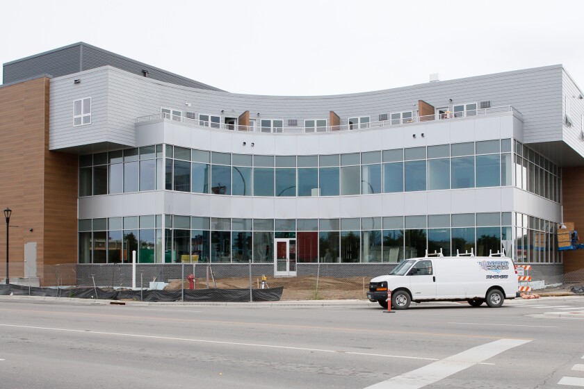 'This project has become the signature of downtown Moorhead.' Block E ...