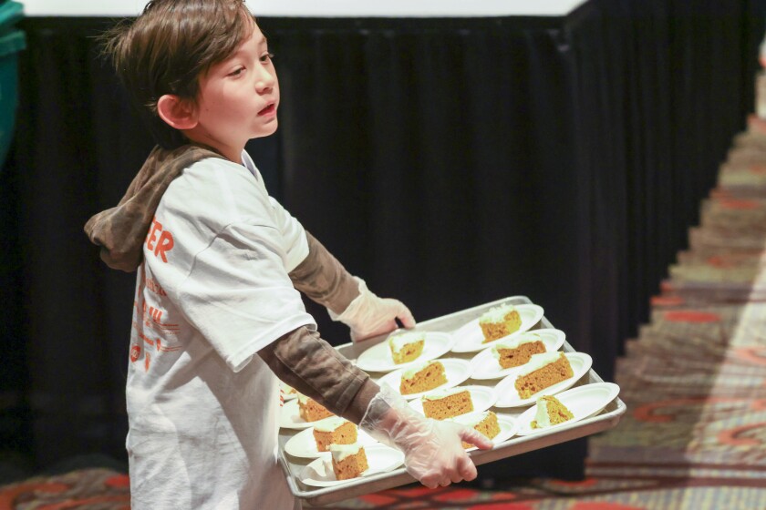 people gathering for community meal