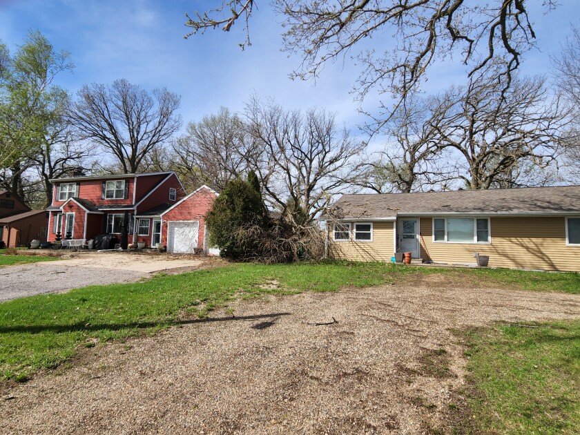 A tree fell between two houses on Lake Ripley Drive in Litchfield.