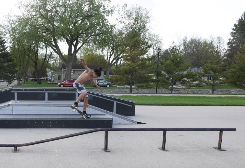 Skateboarders practice their moves at Worthington's local park on Sunday, May 15, 2022.