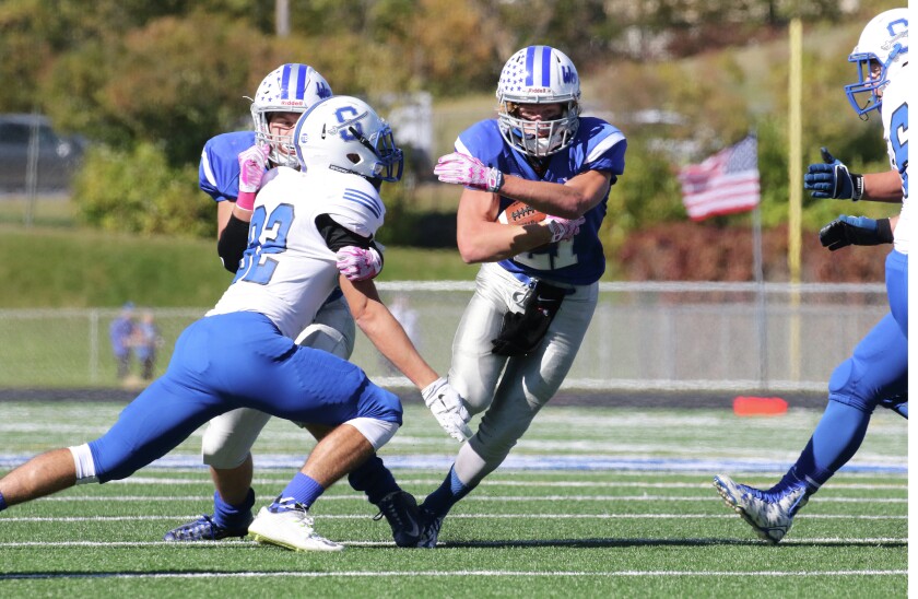 Brainerd’s Allen Jevning runs the ball Saturday against Sartell-St. Stephen. (Kelly Humphrey, Brainerd Dispatch - Gallery)