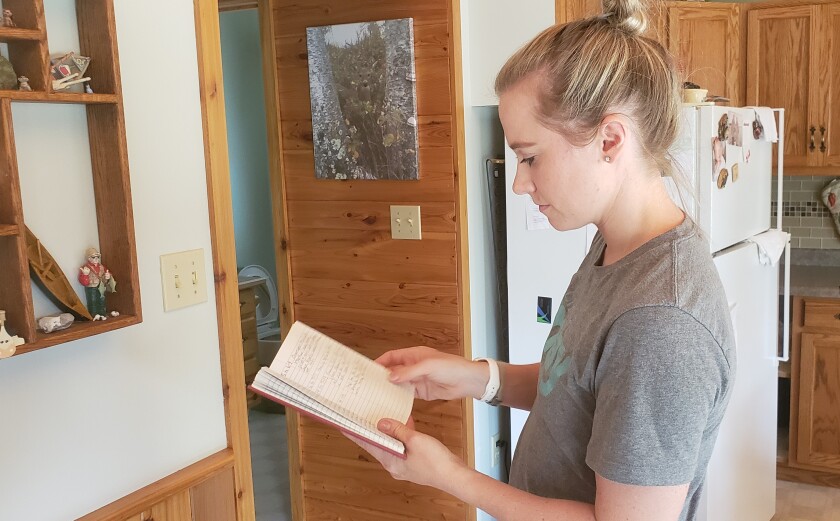 CANADABORDERFOLLOW-Laura and diary.jpg