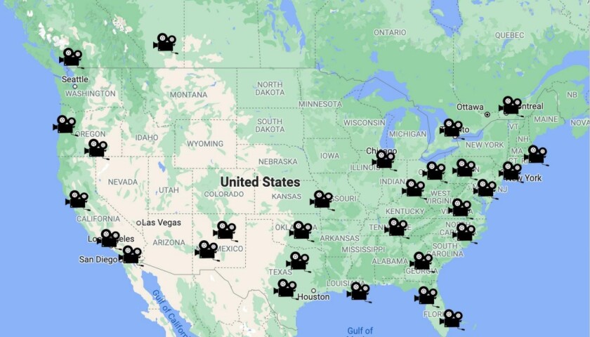 A map of the United States, scattered with small film projector icons up and down the coasts and across the South.