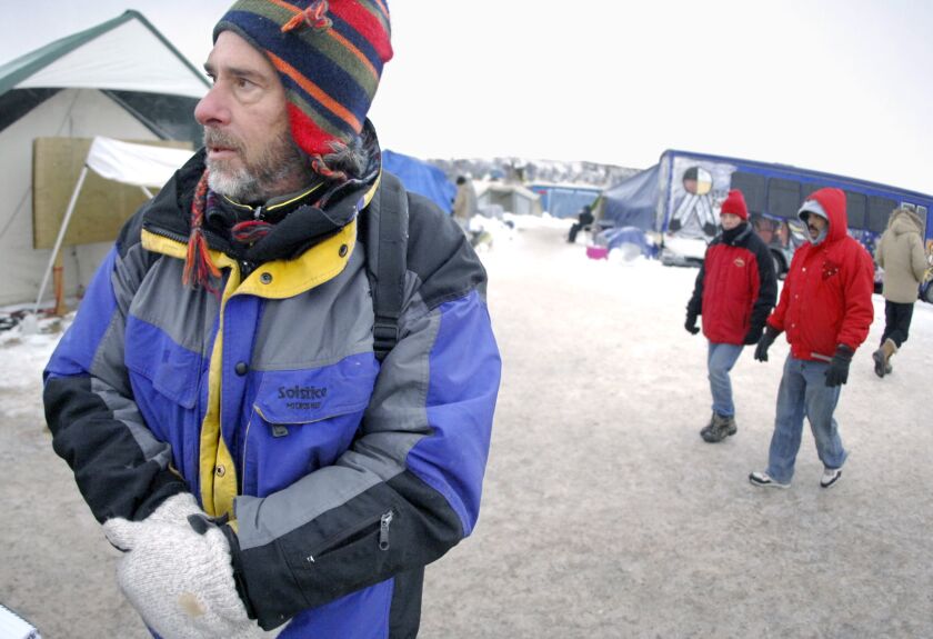 Rob Lewis, 56, of Bellingham, Wash., talks from the Oceti Sakowin camp on Monday about the Dakota Access Pipeline protest movement and how it could be used in other areas of environmental concerns across the country. (Mike McCleary, Bismarck Tribune).
