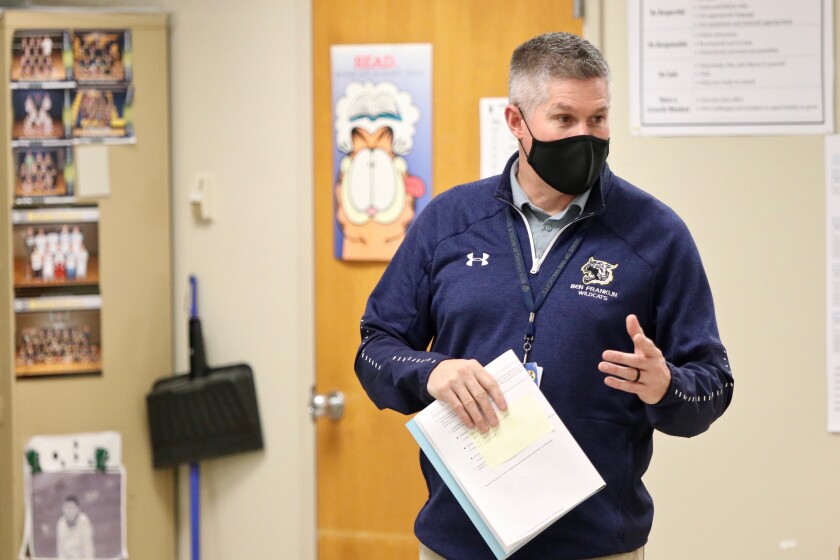 Ben Franklin Middle School science teacher Travis Hoeg teaches sixth grade on Monday, Dec. 21.jpg