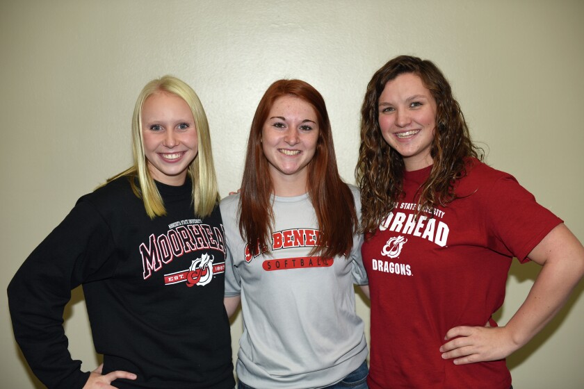 Kylie Lange (left) has signed a NCAA national letter of intent to play softball for Minnesota State University at Moorhead, Jillian Ewald has signed a NCAA national letter of intent to play softball at St. Benedict and Julia Wallace has signed NCAA national letter of intent to swim at Minnesota State University Moorhead. The girls celebrated the event with a ceremony in the Brainerd High School Cafeteria Wednesday. (Steve Kohls/ Brainerd Dispatch