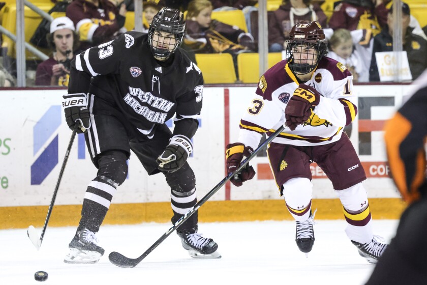 college men play ice hockey