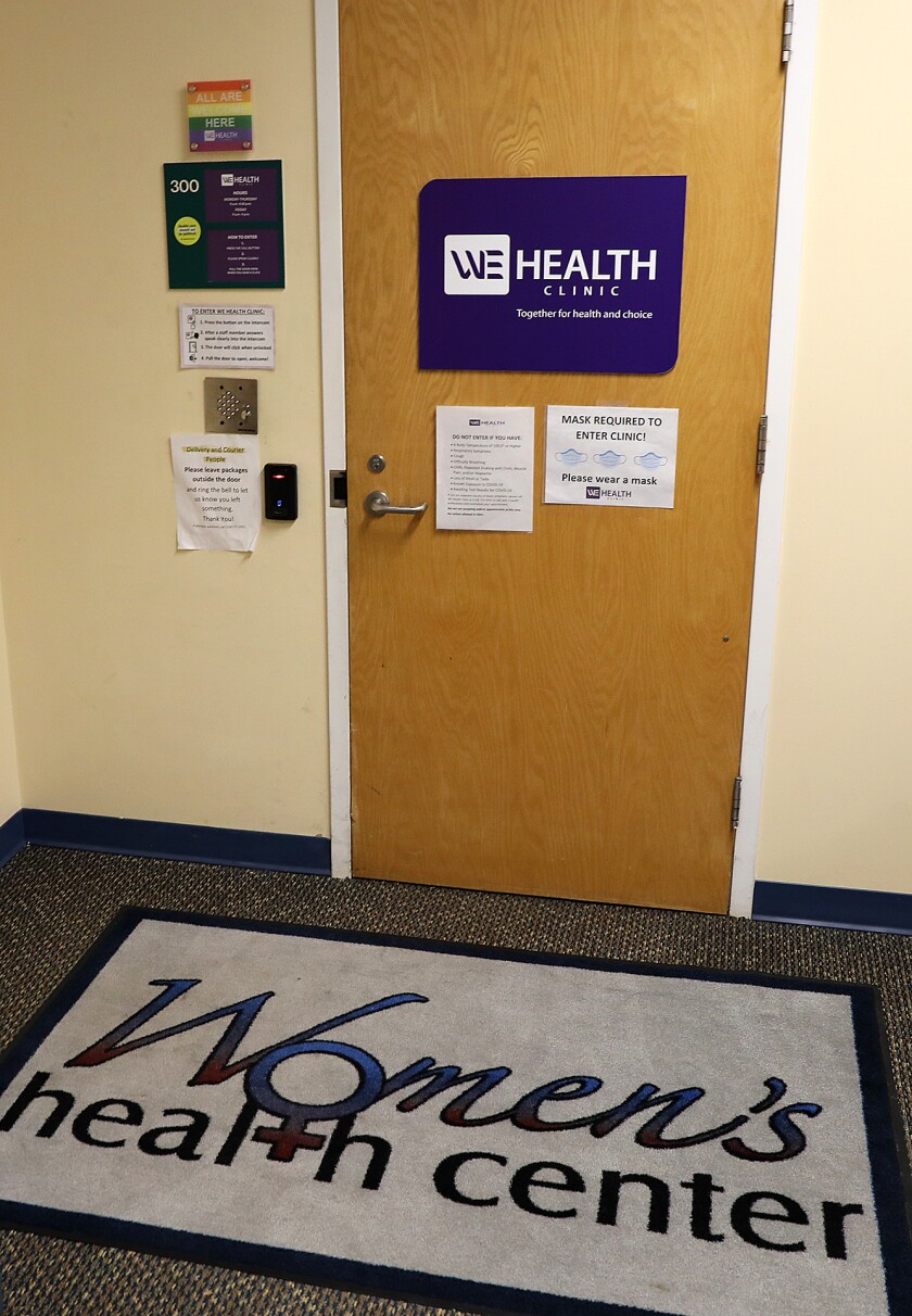 Notes are posted for clients at WE Health Clinic
