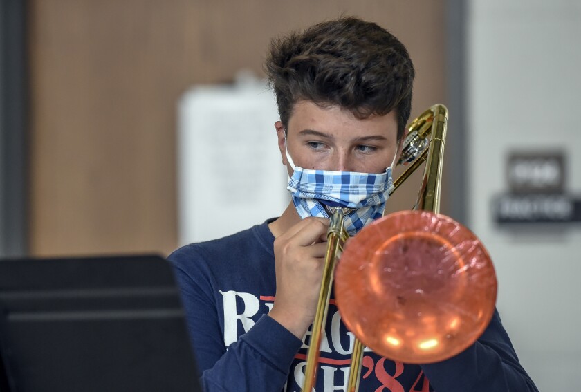 Musical masks allow Mitchell, SD, band students to play