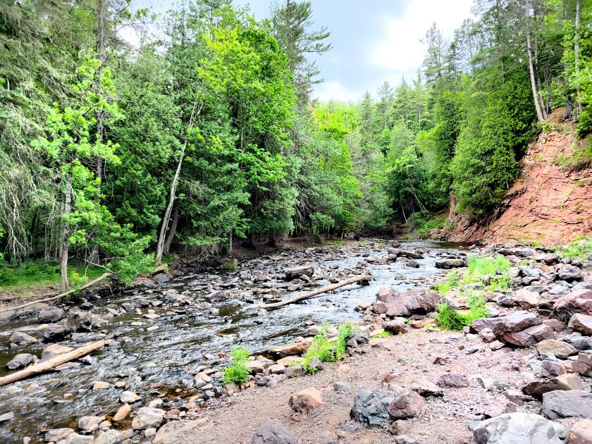 Soft sandstone and clay hug the Black River south of Superior.