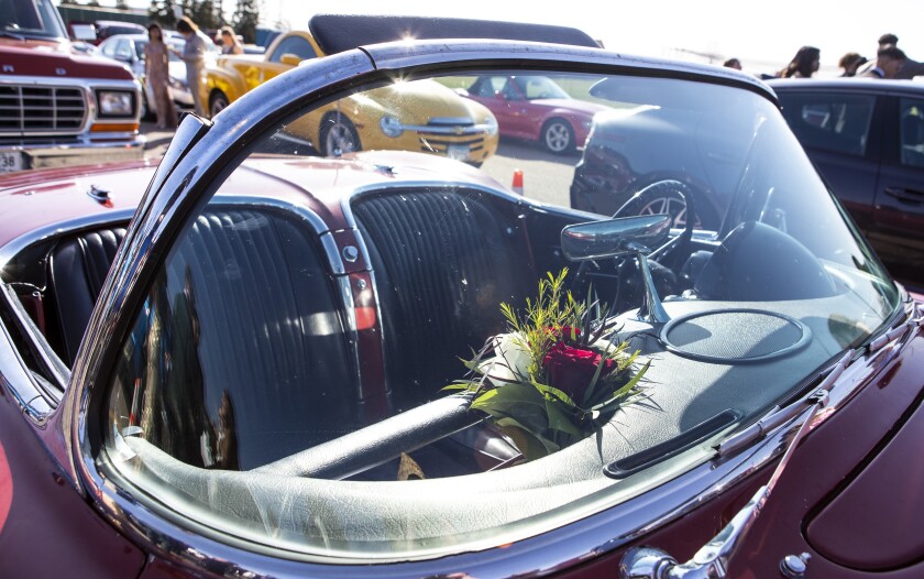 A vibrant corsage sits on the dashboard of a classic Corvette car just before the start of the grand march for this year's prom at Willmar High School on Friday, May 6, 2022.