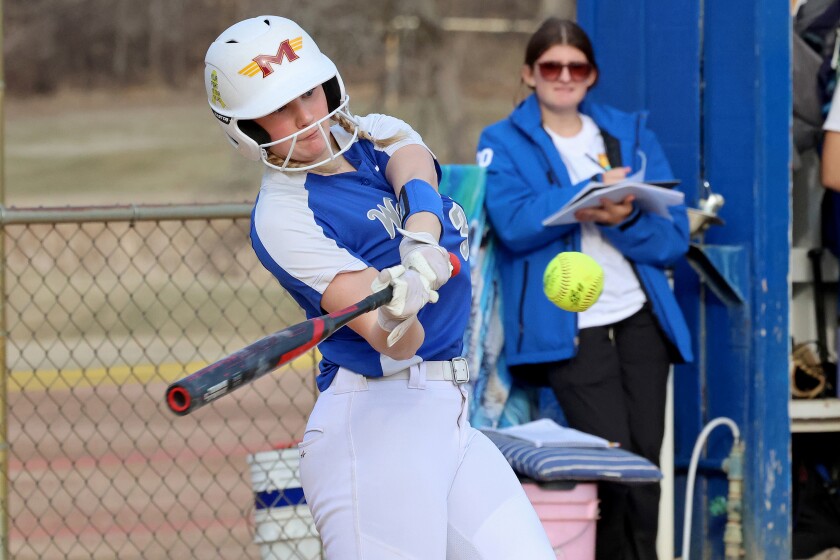 Batting hitting the ball.