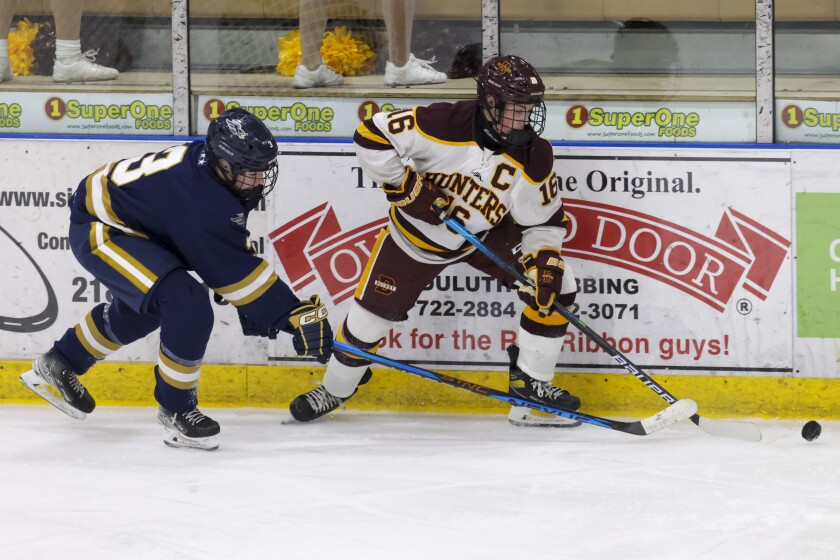 high school boys play hockey