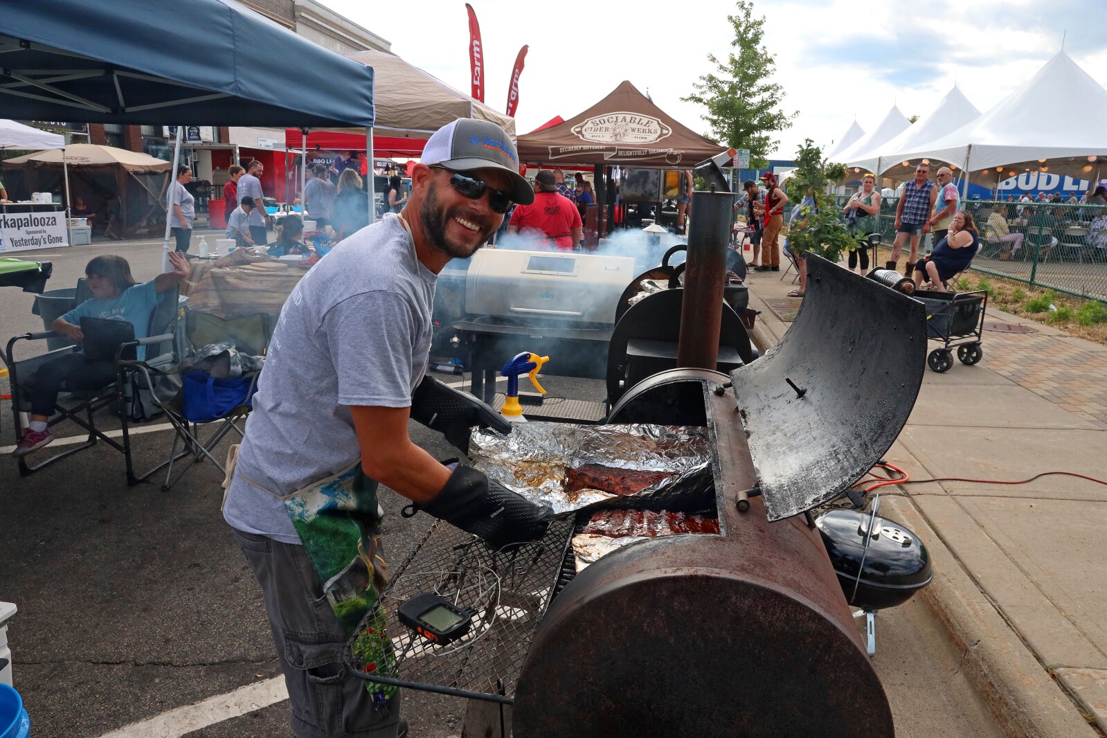 People enjoy the Cub Foods Ribfest during Brainerd Jaycees Street Fest on Saturday, July 23, 2022, in downtown Brainerd.