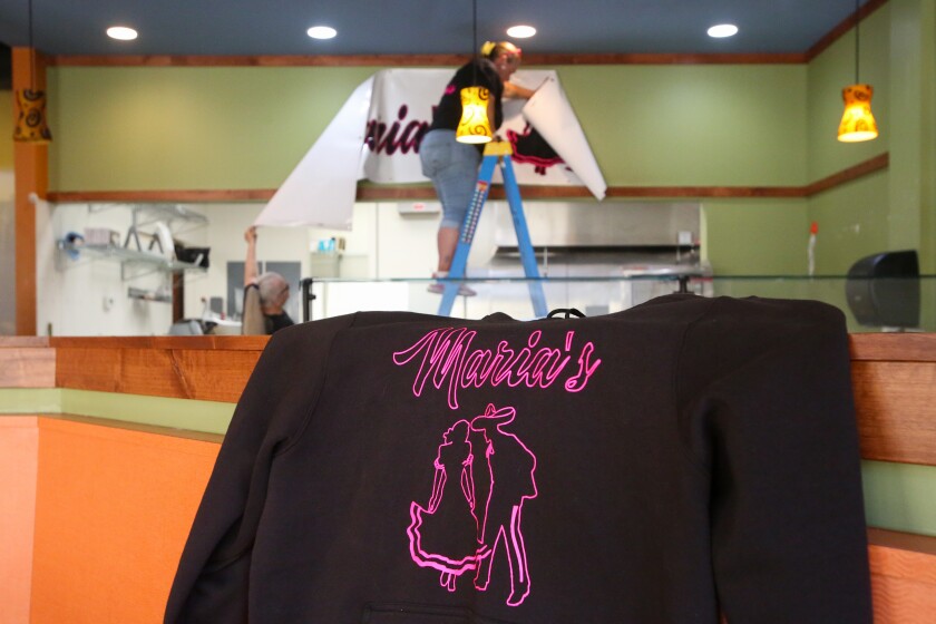 Maria E. Carpenter Ostos and her mother, Martha Salas, work on getting Maria's Homestyle Mexican Food restaurant ready on Wednesday, Sept. 24, 2025, for opening in the former Smiling Moose in downtown Fargo.