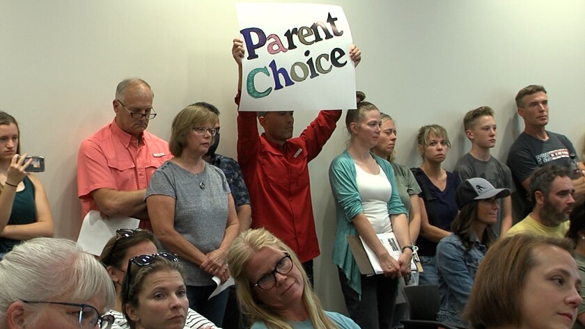 Parents cheer with joy, shout in anger as Moorhead Area Public Schools approves new mask mandate