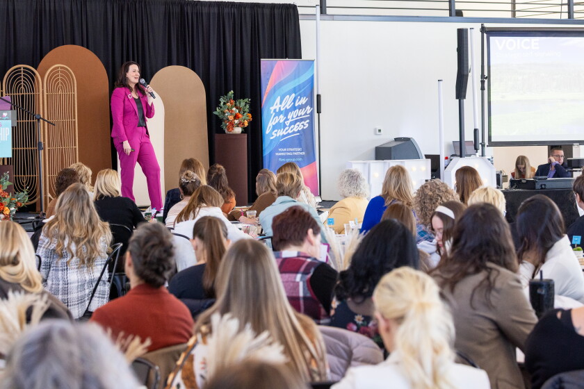 Kristi Huber speaks at the Women's Leadership Summit in Dickinson.