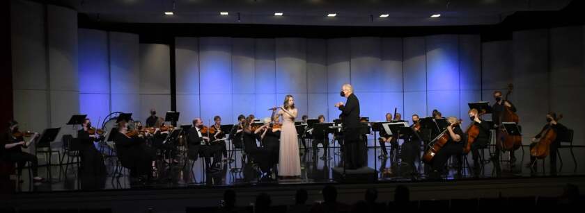Greta Hulterstrum,a flute player, performs with the Willmar Area Symphonic Orchestra