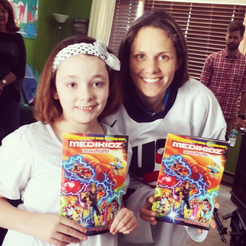 As part of her experience of starring in a comic book when she was 12, Hannah Poshek, who has epilepsy, was able to meet Chanda Gunn, U.S. hockey Olympic gold medalist who was diagnosed with epilepsy at age 9.