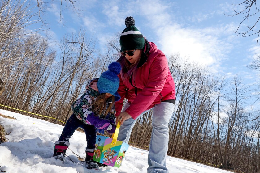 Families enjoy the Annual Lake Shore Easter Egg Hunt Saturday, April 17, 2022, at Fritz Loven Park.