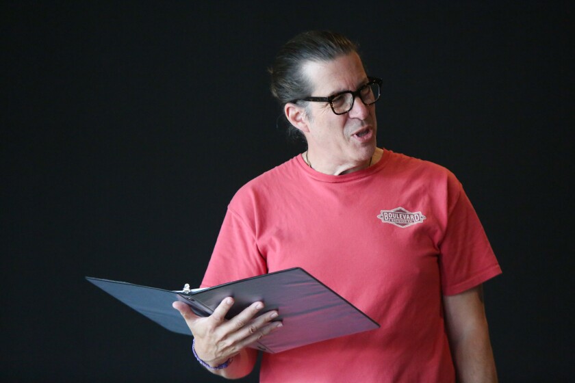 Jeffrey Rondeau reads his part in the play "The Guys" during a rehearsal on Monday, Sept. 8, 2025, at Stage West in West Fargo.