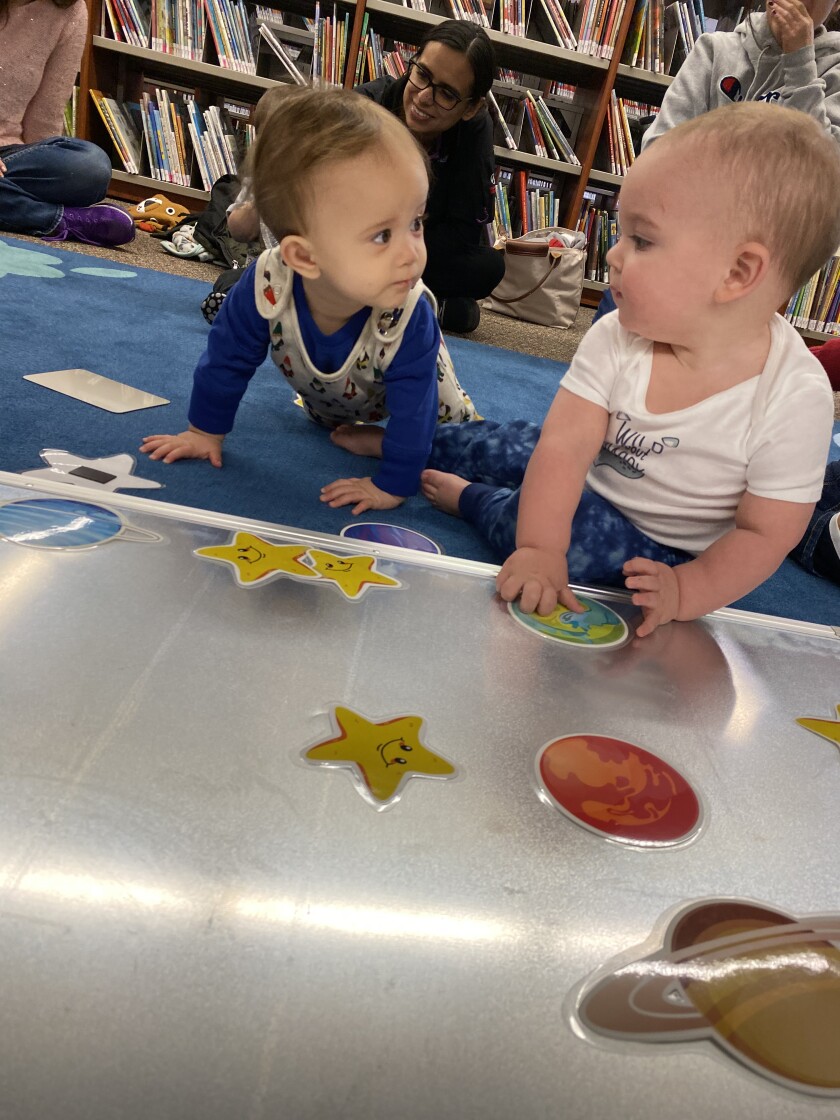 Babies socializing at Baby Boost Storytime (1).jpeg