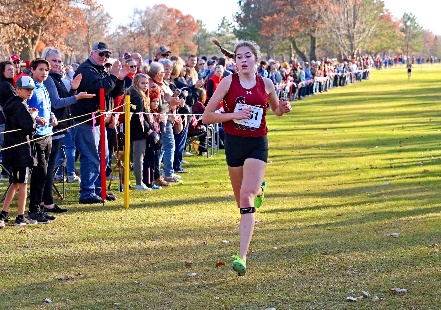 Cross-country runner at the finish line.