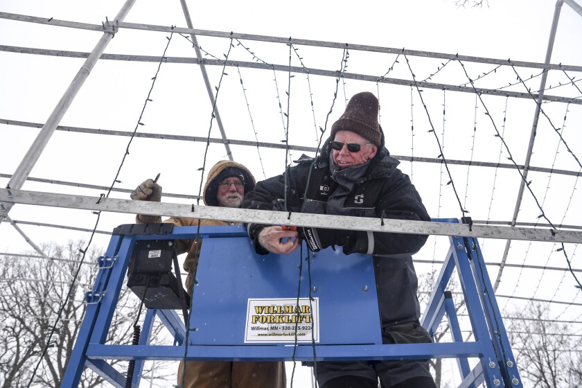 Lights out: Volunteers take down holiday light display at Robbins ...