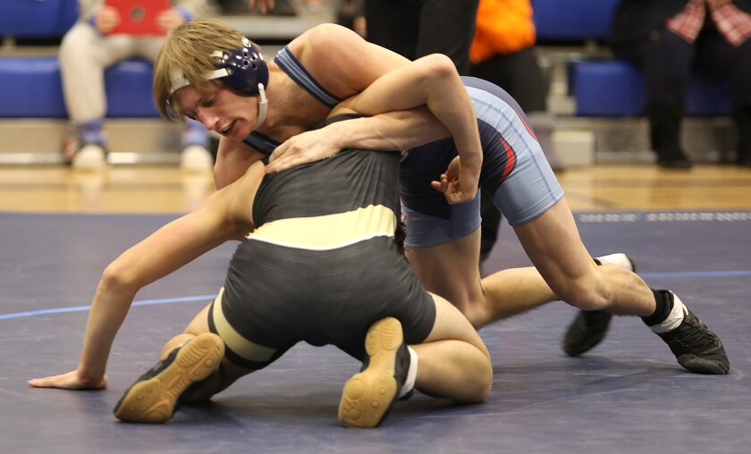 Superior’s Jason Thomas maintains control during his victory at 152 pounds