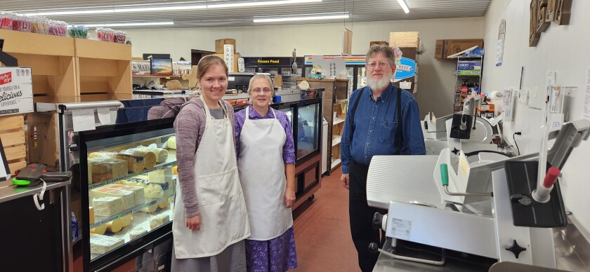 Employees Hannah Chupp and Yvonne Vohler stand in the deli area with Steve Taylor, owner of Taylors Country Store in Grove City.