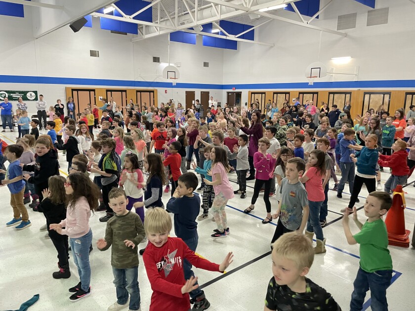 On April 18, 2022, the entire Heart River Elementary School student body tests out the newly installed interactive playground during the school assembly.