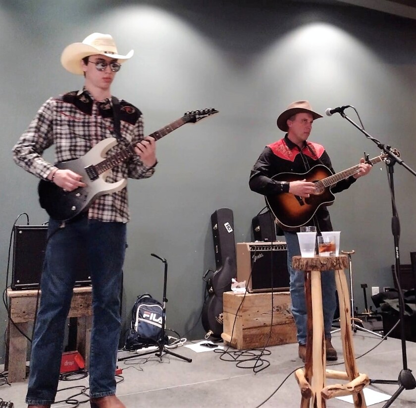 Jason and Blake Waldron 2 play guitar