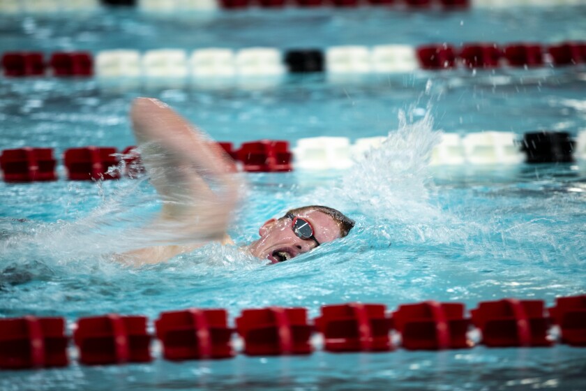 Willmar eighth-grader Soren Newberg swims in the 500-yard freestyle varsity race