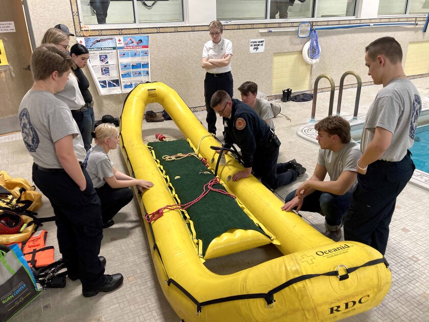 Fire chief checks an inflatable rescue boat