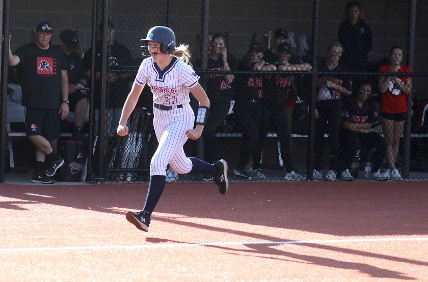 Superior’s Emma Raye (27) lets out a yell after crushing a sixth inning home run