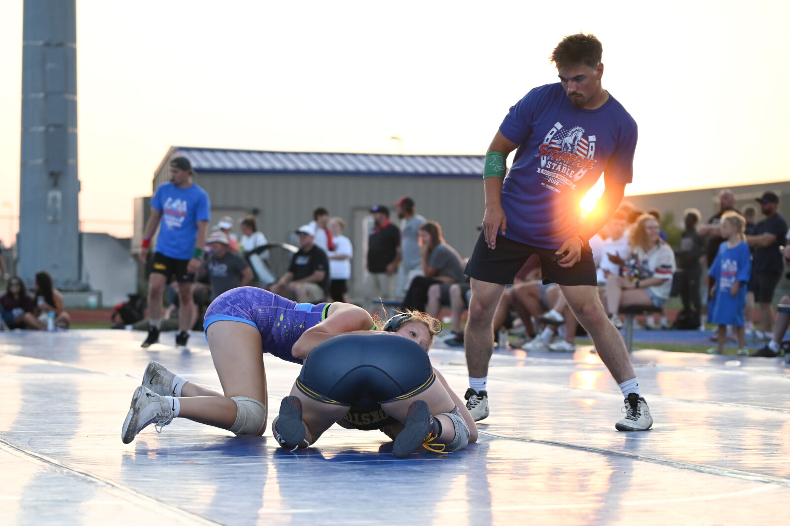 Stampede at the Stable outdoor wrestling tourney turns into a family affair at Sheyenne