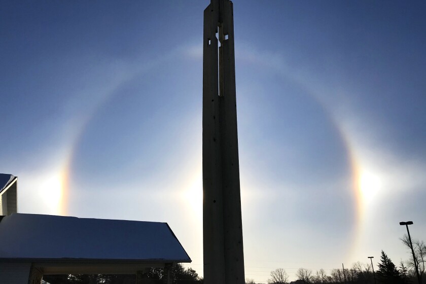 Sun dogs and cross