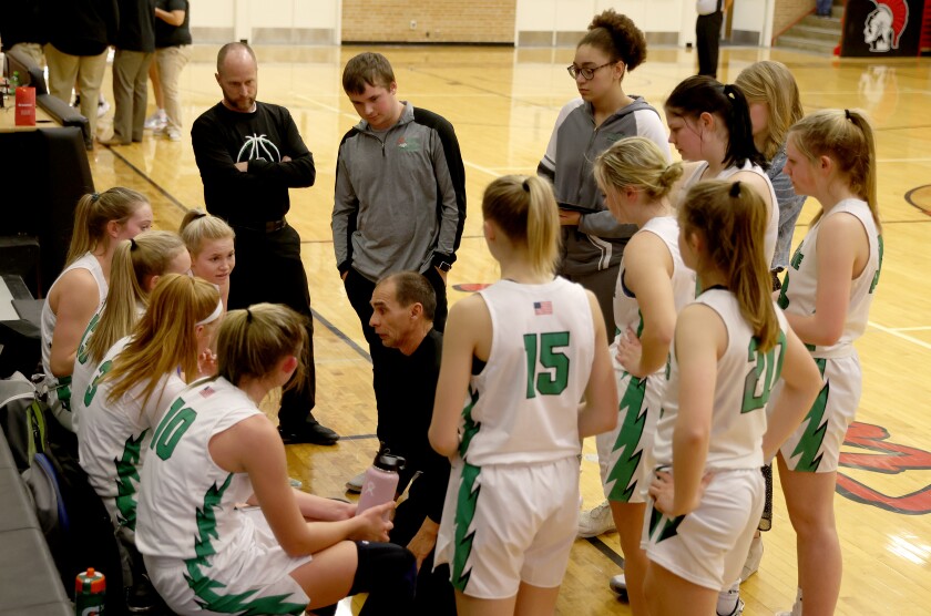 Pipestone Area head coach Ed Gustafson calls a timeout to go over a way to break through the Trojan defense during a Friday night game.