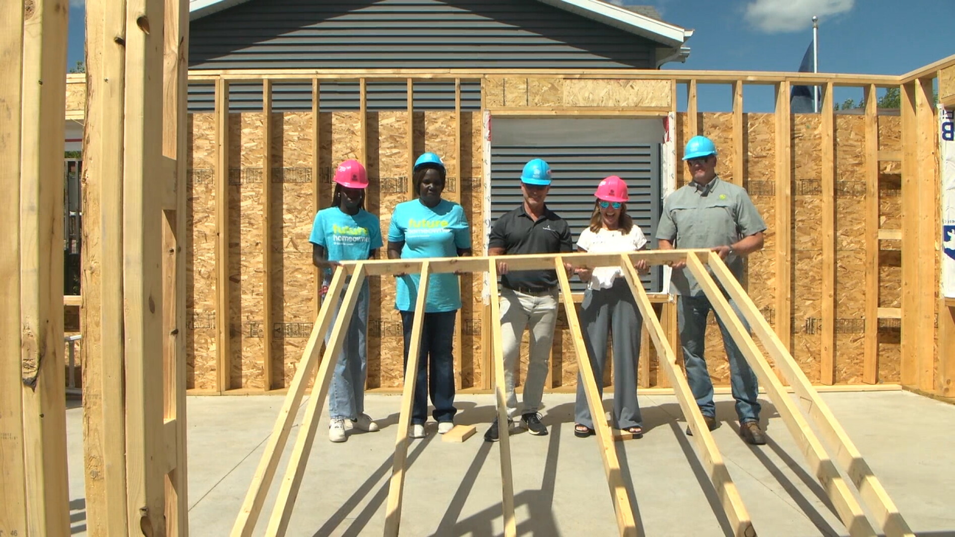 Habitat for Humanity raises wall on 90th home