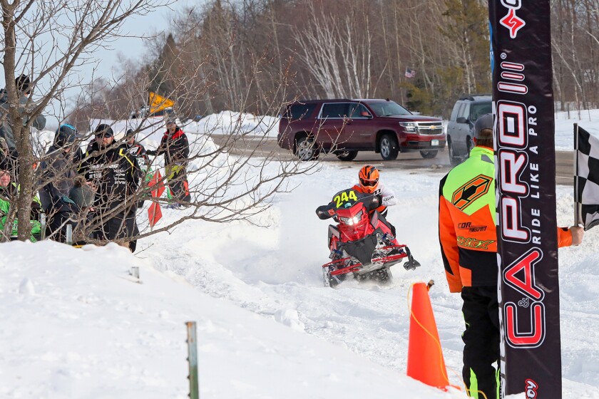 Snowmobilers race