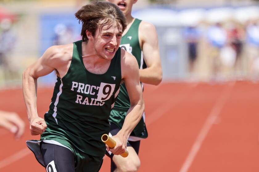 High school athletes compete in track and field events at outdoor stadium
