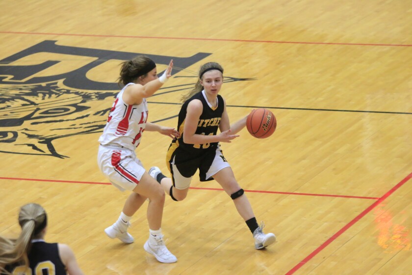Mitchell's Mandy Schmidt steps into a bounce pass during a girls basketball game Saturday at Brandon Valley.