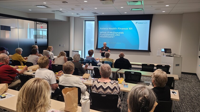 Kim at past bite sized convo meeting.jpg