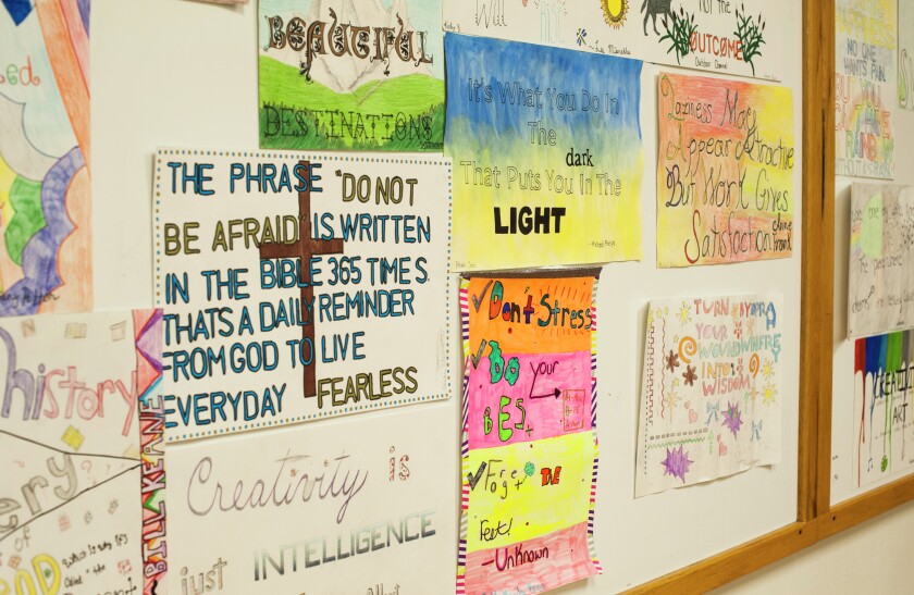 Posters line the back of Mel Fathke's classroom in Avon. Creating posters are a common practice in Fathke's teaching. (Sarah Barclay/Republic)
