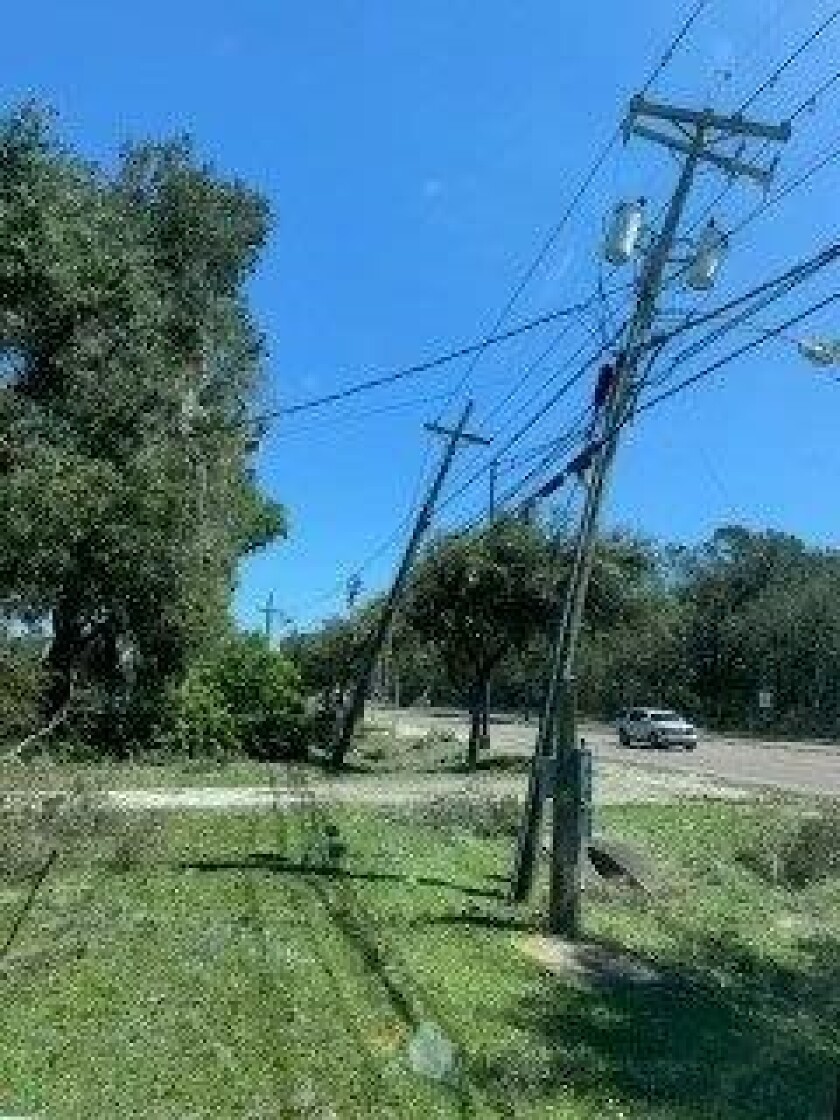 Broken power lines and poles that had to be repaired in order to restore power in the region of Bartow, FL following Hurricane Ian.