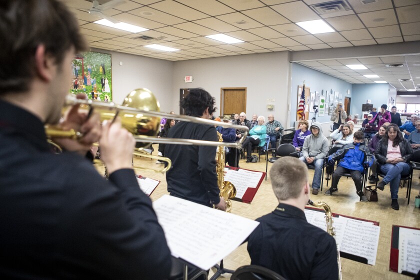 Attendees listen to the KMS High School Jazz Ensemble at the Willmar Community Center on Wednesday, March 30, 2022.